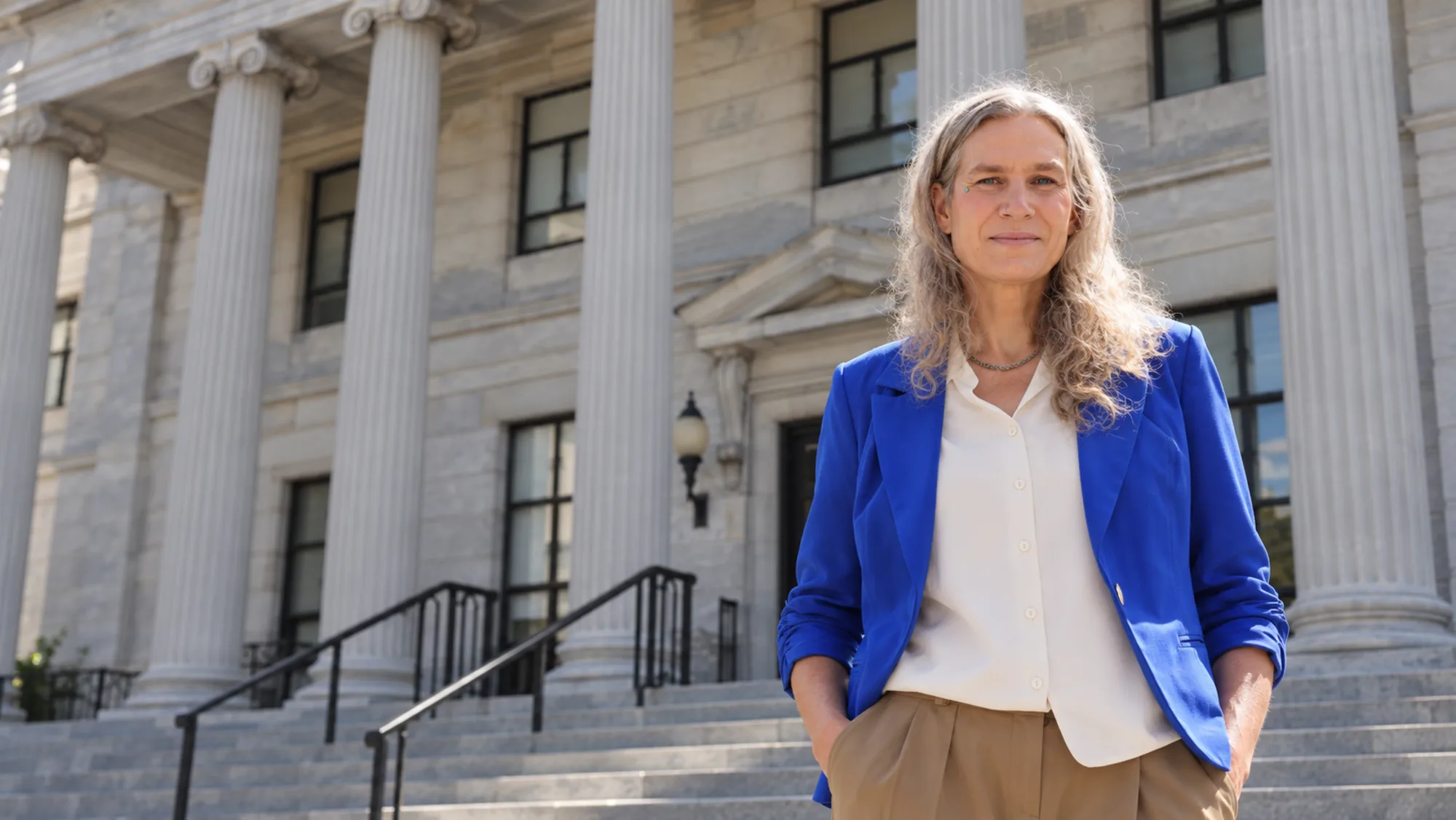 Sophia Zoë Kilmer standing on the steps of the Montgomery County Courthouse